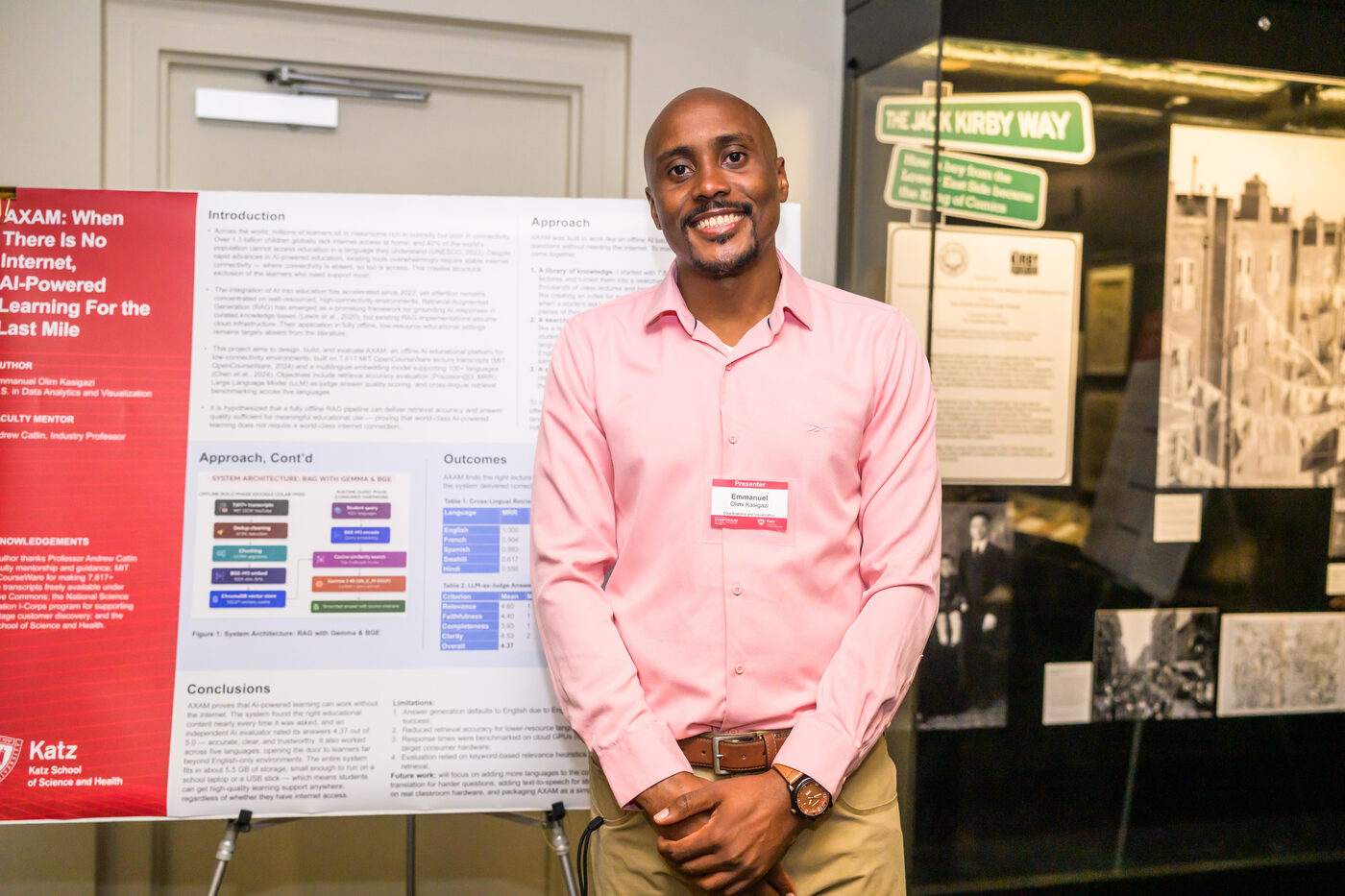 Emmanuel presenting the AXAM research poster: 'When there is no internet, AI-powered learning for the last mile'